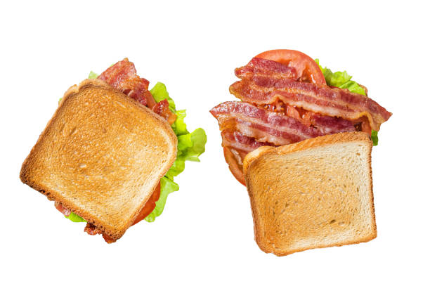 BLT toasted sandwich with bacon, tomato and lettuce.  Isolated, white background