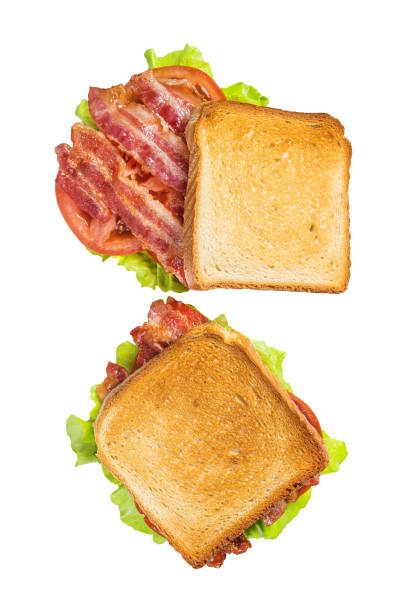 istock BLT toasted sandwich with bacon, tomato and lettuce.  Isolated, white background. 1820232229