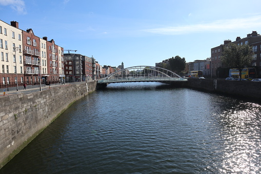 Dublin, Ireland – September 20, 2021:  James Joyce bridge over the River Liffey from Rory O'More bridge