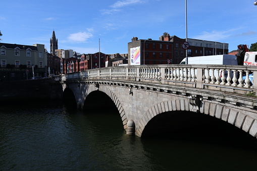 Dublin, Ireland – September 20, 2021: Father Mathew Bridge over the River Liffey from Arran Quay