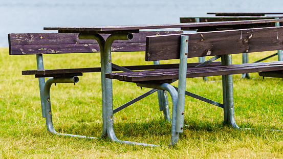 Picnic site table and benches near fjord in Flam Norway, Europe.