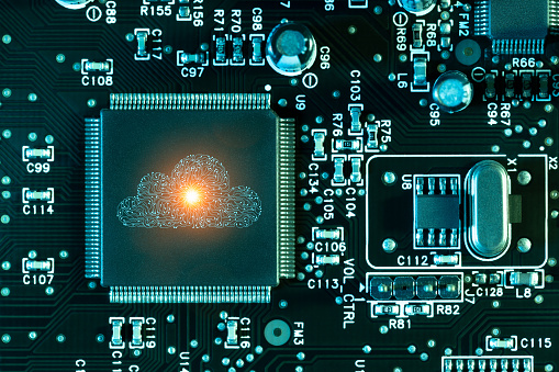 Cloud computing Artificial intelligence backup sybol computer chip concept on circuit board. This file is cleaned and retouched.
