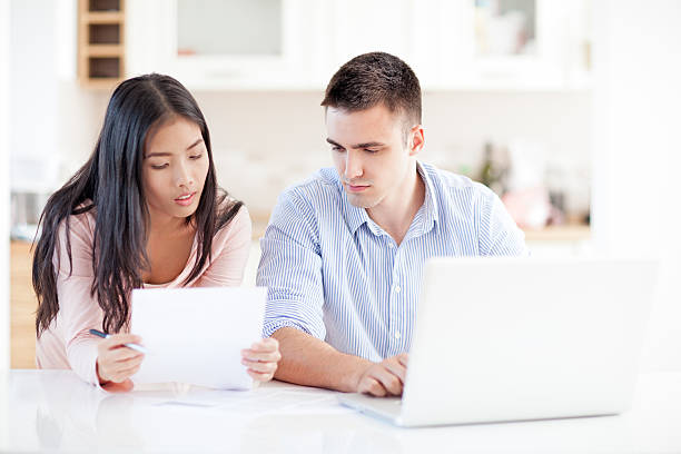 istock Couple Calculating Home Finances 182025021