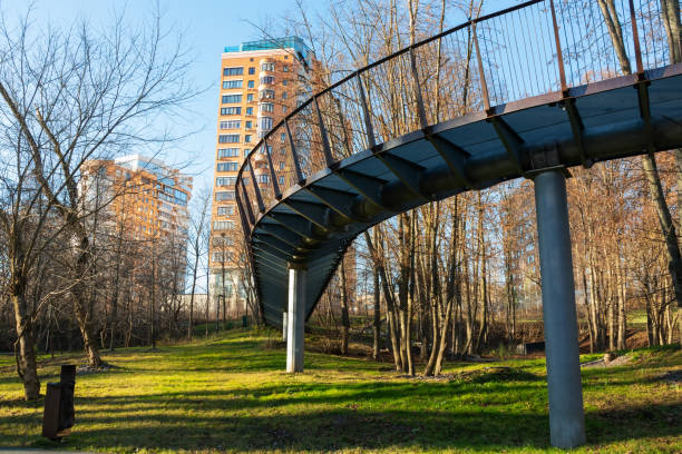 Bicycle viaduct or pedestrian bridge in a city park stock photo