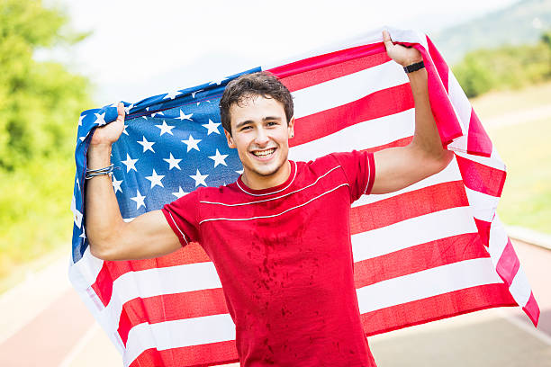 istock American Athlete with National Flag 182025575