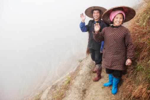 Rice Farmers On Paddy Fields, Longsheng, China