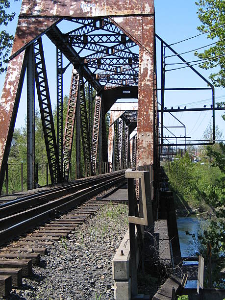 Rusty Tressle Rusty railroad bridge in Oregon. tressle stock pictures, royalty-free photos & images
