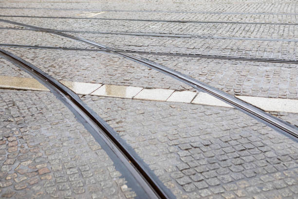 istock Tram lines in a wet cobblestone street 1820259290
