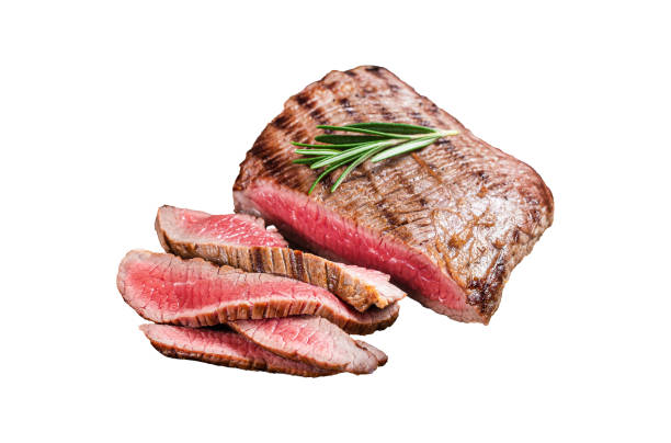 istock Barbecue dry aged wagyu Flank Steak on a cutting board.  Isolated, white background. 1820259768