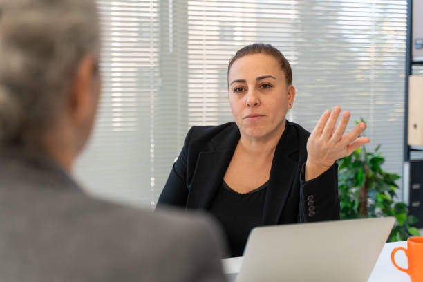 istock Manager getting angry because she doesn't like the work done by an employee in the office 1820259898
