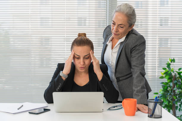 istock Angry boss yelling at her employee, she is stressed and feeling frustrated on work 1820260048