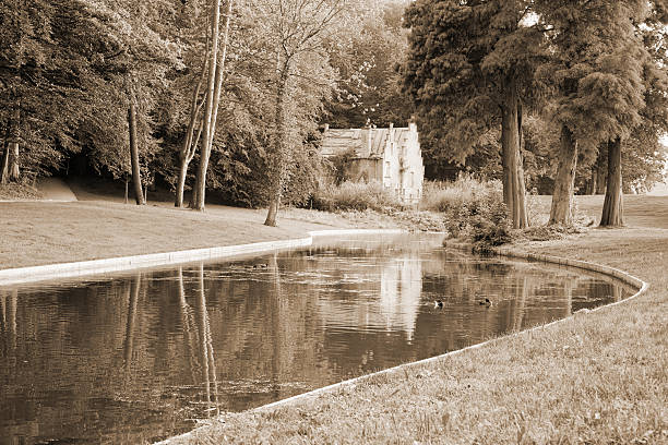 istock Desolate house with pond at edge of the forest 182026133