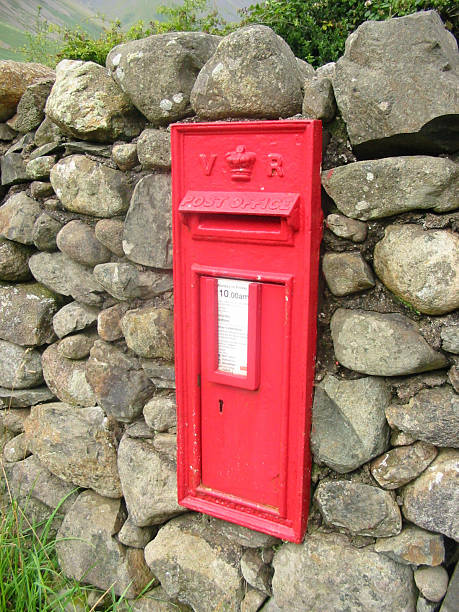 istock Nineteenth Century Victorian Royal mail postbox set in stone wall 182026192