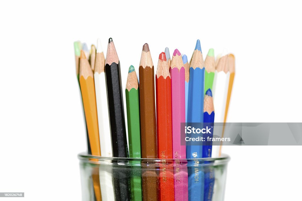 Coloring Pencils Lots of coloring pencils in a clear glass Art Stock Photo