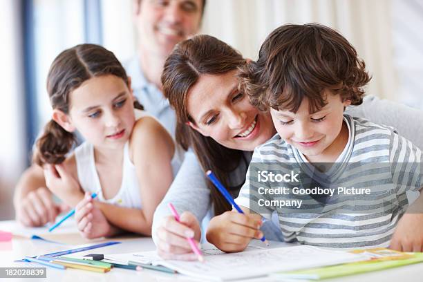 Participating In Their Childrens Education Stock Photo - Download Image Now - Child, Sketch Pad, Adult