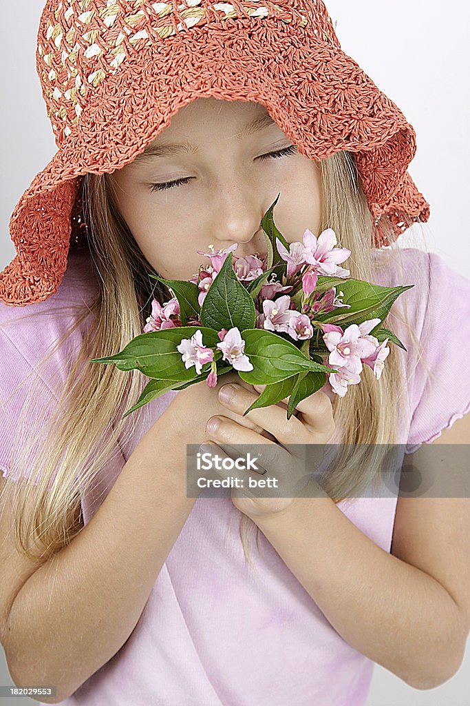 Mädchen mit red hat - Lizenzfrei Blume Stock-Foto