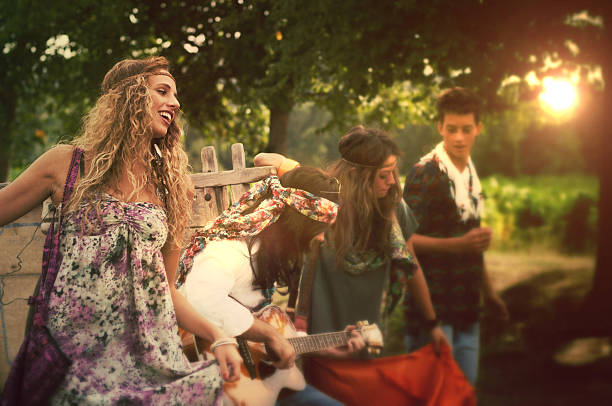 istock Hippies Dancing and Playing Guitar . 1970s style. 182030019