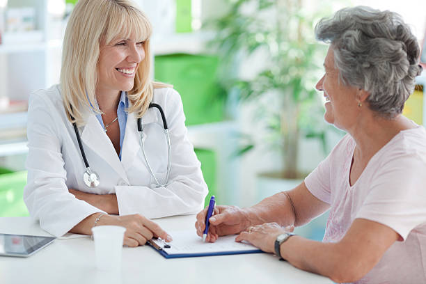 istock Senior woman at doctor's office. 182030173