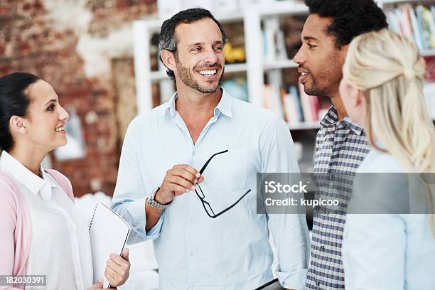 Commenting On A Great Suggestion Stock Photo - Download Image Now - Adult, African Ethnicity, African-American Ethnicity