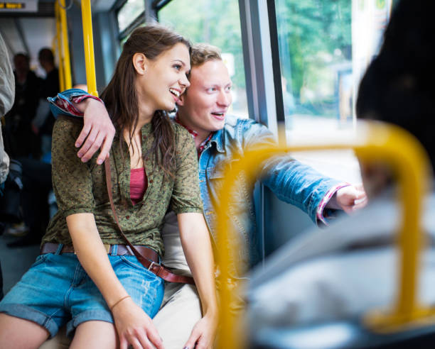 istock Young couple in a bus looking through window. 182030444