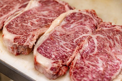 Raw Japanese wagyu sirloin steak. Raw fresh marbled meat
