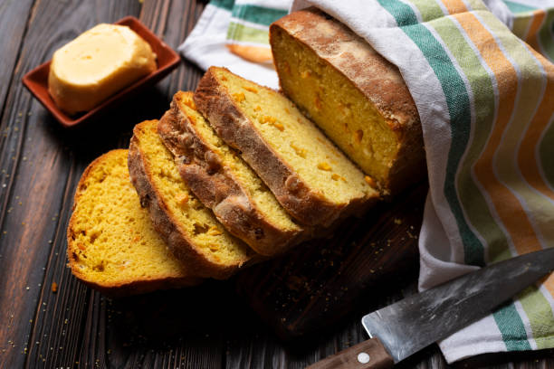 istock Homemade cornbread slices and butter on kitchen table 1820311086