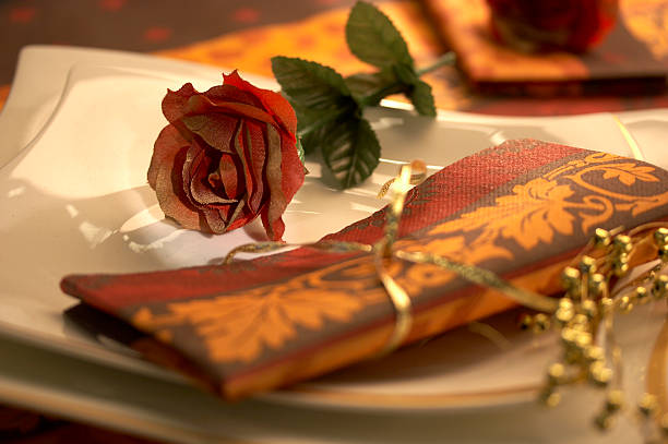 istock Rose and decorated napkin on the plate 182031680