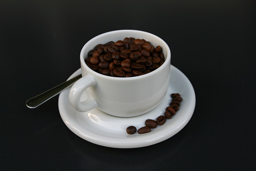 cup of coffe with coffee beans