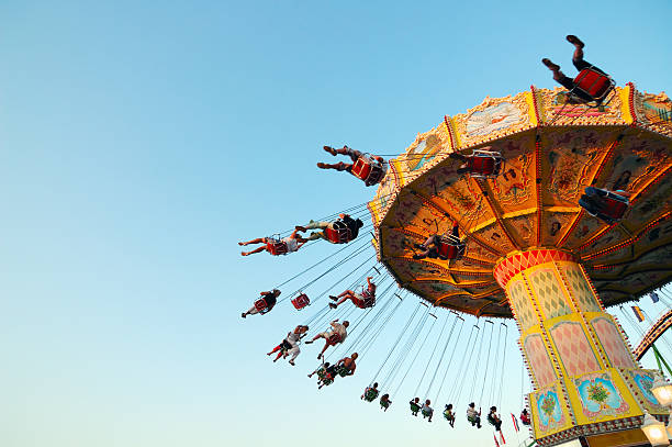 chairoplane a carousel in action amusement park photos stock pictures, royalty-free photos & images