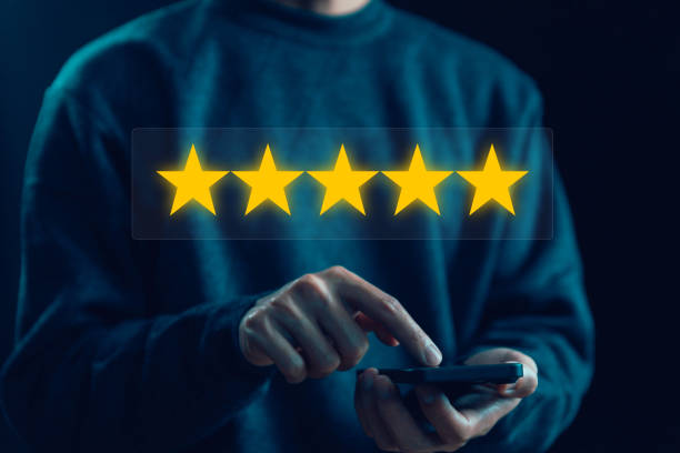 istock 5-star rate review of client from smartphone 1820328514