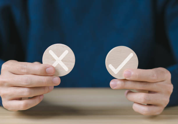 istock wood block showing check right and wrong choice 1820329059
