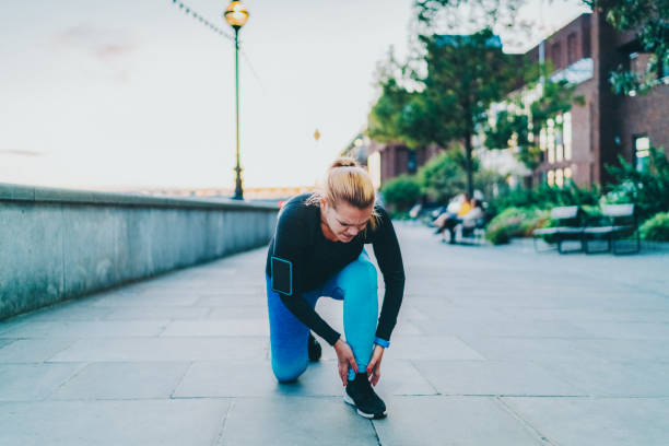 istock Sportswoman with painful ankle 1820332754