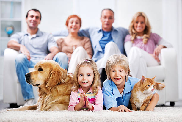 istock Cheerful family with pets. 182033605
