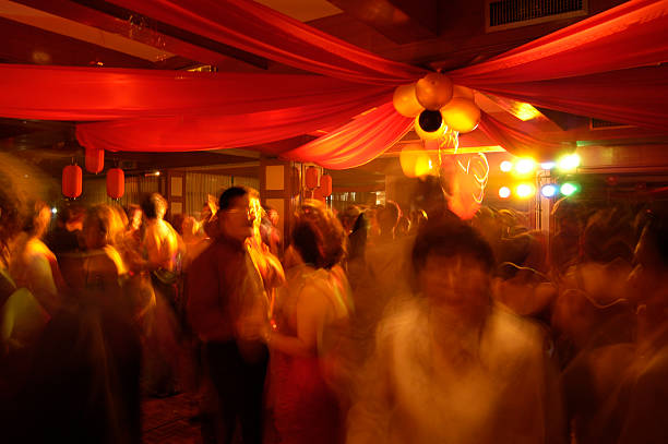 istock Blurry image of people partying 182033774