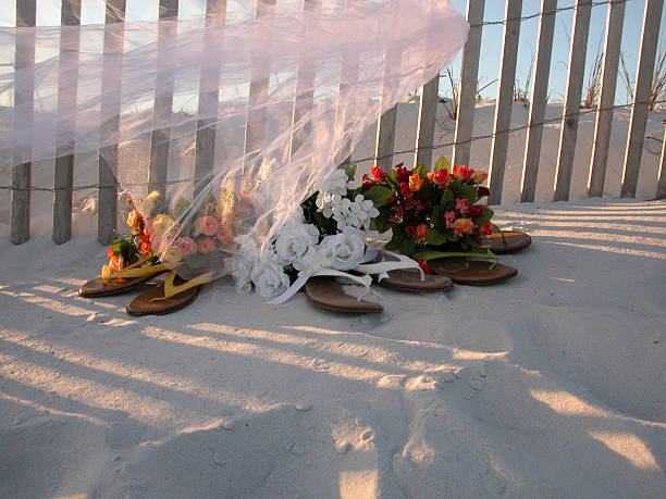 Bride Beach Shoes and Flowers stock photo