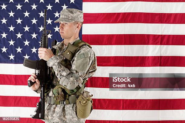 Army Man Standing In Front Of American Flag Stock Photo - Download Image Now - 20-29 Years, Adult, Adults Only