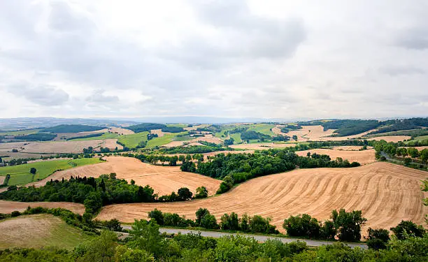 Photo of patchwork landscape at moody sky in France