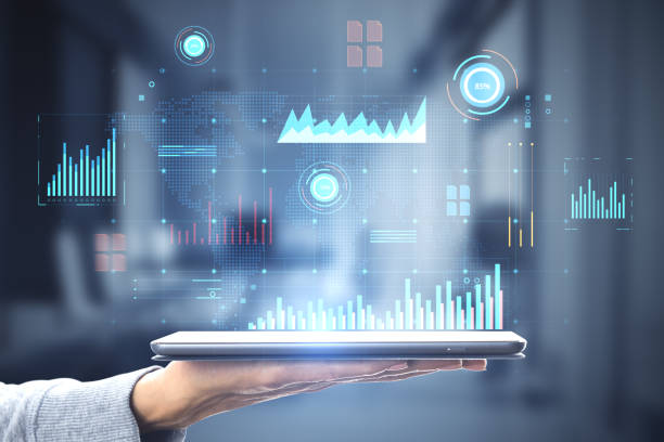 istock Tablet displaying digital financial analysis with blue overlay 1820365702