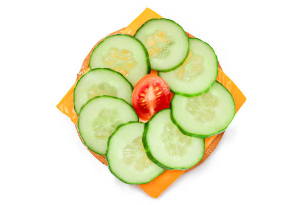 istock Cracker Sandwich with Fresh Cucumber, Tomato Cherry and Cheese - Isolated 1820370674