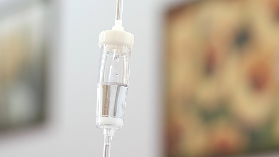 Close-up of an IV used to inject medication into a patient's vein.