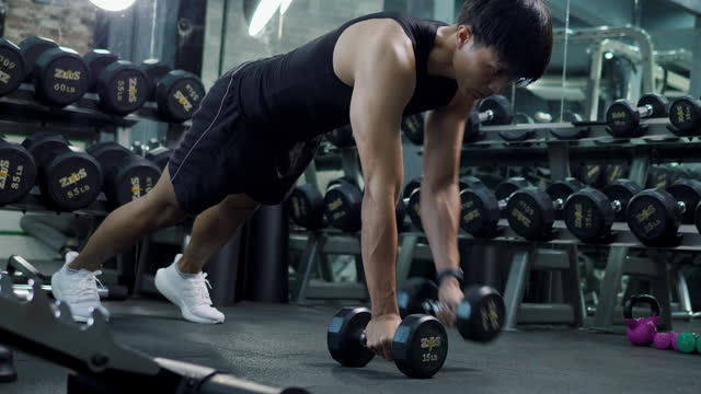 Lifting dumbbells, exercising, bodyweight training Exercise in the gym exercise schedule Do muscle exercises, exercise activities for good physical health.