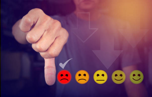 istock Customer service concept and dissatisfaction Business people touching virtual screen on frown icon who are angry in order to cause dissatisfaction with the service, rating, and dissatisfaction 1820407013