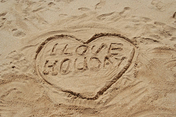 istock Heart in the sand 182041689