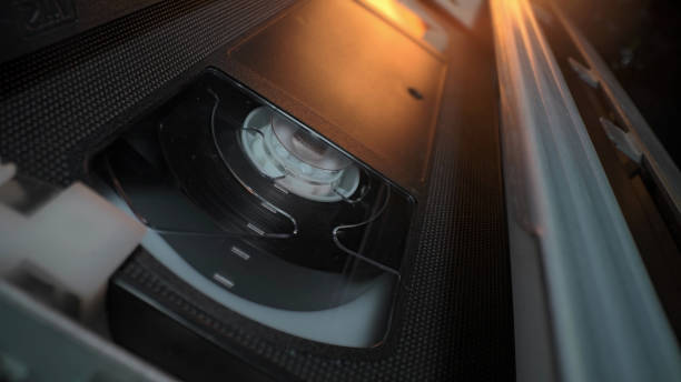 istock VHS mechanism inside, cassette player, magnetic head. Rotation reel, video tape 1820420432