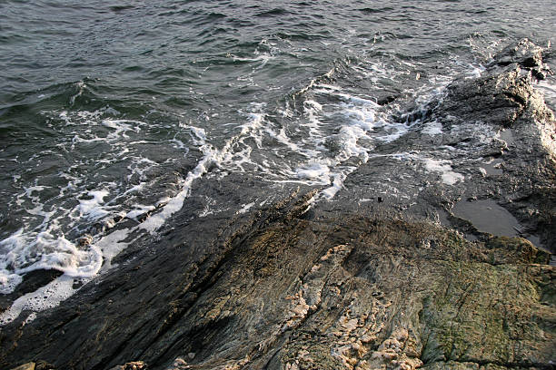Waves at the shore stock photo