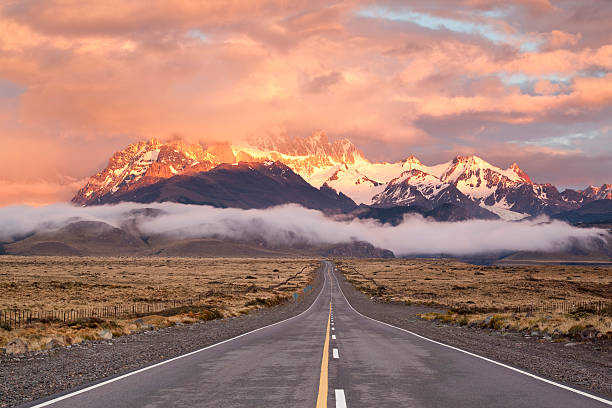 Dramatic sky over empty highway in Argentina Patagonia stock photo