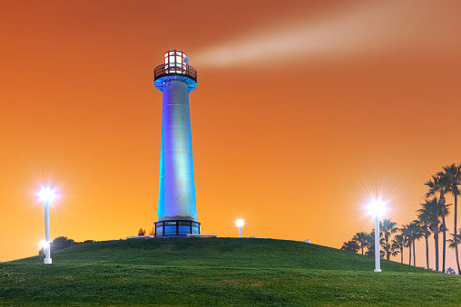 Long Beach, California, USA Harbor Lighthouse at dawn with dramatic fog.