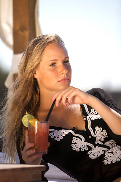 istock Bech girl with cocktail 182043387