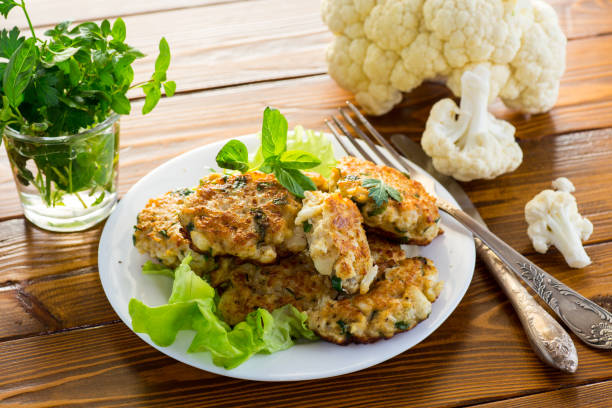 istock cooked vegetarian fried cauliflower cutlets, in a plate . 1820440262