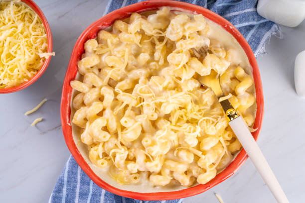 istock Creamy mac and cheese with ingredients for cooking 1820458668